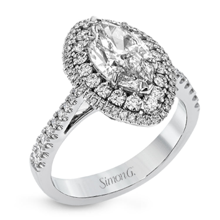 This 18k white gold engagement ring setting has a stunning double halo design set with .61 ctw of shining white round brilliant diamonds.