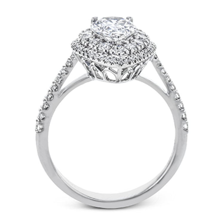 This 18k white gold engagement ring setting has a stunning double halo design set with .61 ctw of shining white round brilliant diamonds.