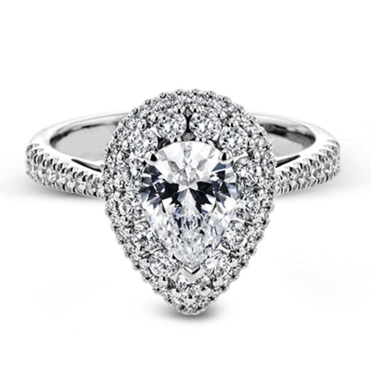 This 18k white gold engagement ring setting has a stunning double halo design set with .61 ctw of shining white round brilliant diamonds.