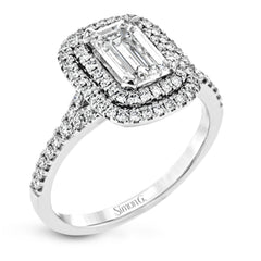 This beautiful, classic style setting features a double halo design built for an oval center stone. It contains .40 ctw of side diamonds.