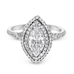 This beautiful, classic style setting features a double halo design built for an oval center stone. It contains .40 ctw of side diamonds.