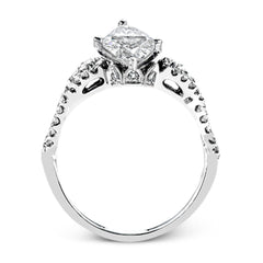 Reflecting an intricate modern design, this remarkable white gold ring is emphasized by a lovely halo complemented with .59 ctw round cut white diamonds.