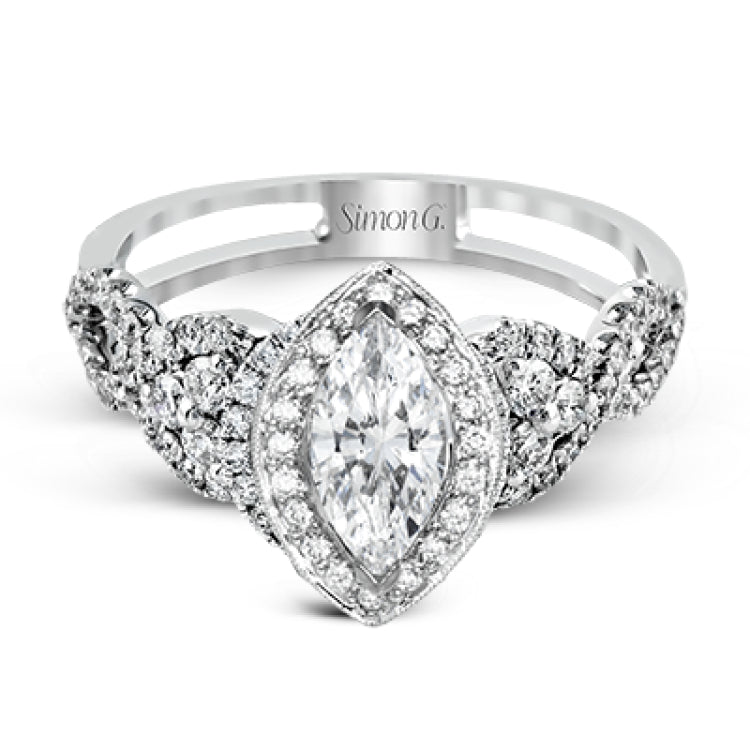 Reflecting an intricate modern design, this remarkable white gold ring is emphasized by a lovely halo complemented with .59 ctw round cut white diamonds.