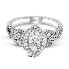 Reflecting an intricate modern design, this remarkable white gold ring is emphasized by a lovely halo complemented with .59 ctw round cut white diamonds.