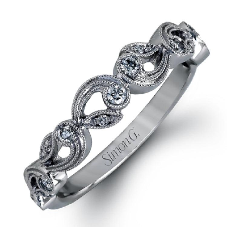 This beautiful vintage-inspired engagement ring design is built for an oval center stone and contains the perfect touches of .28 ctw of white diamonds in its midst.