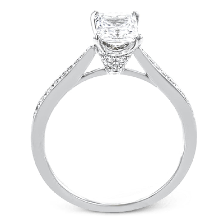 The delicate, understated design of this lovely white gold ring is elevated by .27 ctw of round white diamond accents.