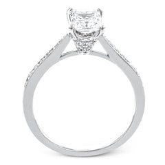 The delicate, understated design of this lovely white gold ring is elevated by .27 ctw of round white diamond accents.