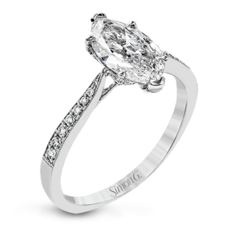 The delicate, understated design of this lovely white gold ring is elevated by .27 ctw of round white diamond accents.