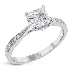 The delicate, understated design of this lovely white gold ring is elevated by .27 ctw of round white diamond accents.