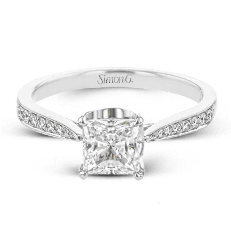 The delicate, understated design of this lovely white gold ring is elevated by .27 ctw of round white diamond accents.