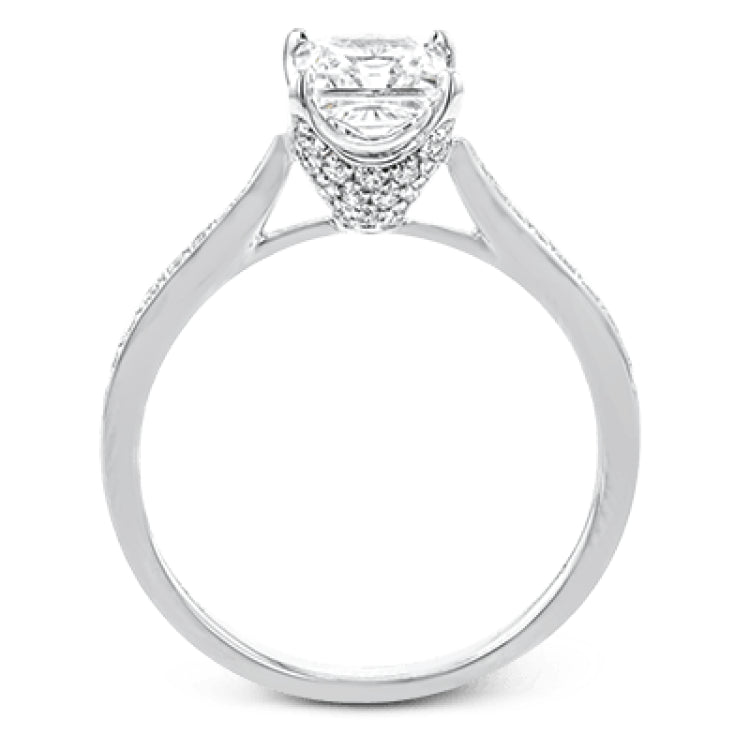 The delicate, understated design of this lovely white gold ring is elevated by .27 ctw of round white diamond accents.