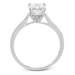 The delicate, understated design of this lovely white gold ring is elevated by .27 ctw of round white diamond accents.