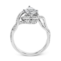 Classic with a modern twist, this white gold engagement ring features .50 ctw of sparkling white diamonds in a dramatic openwork design.