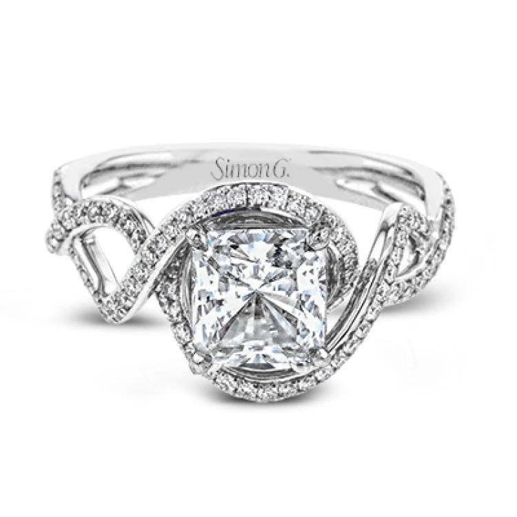 Classic with a modern twist, this white gold engagement ring features .50 ctw of sparkling white diamonds in a dramatic openwork design.