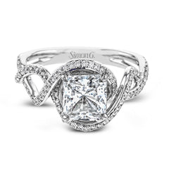 Classic with a modern twist, this white gold engagement ring features .50 ctw of sparkling white diamonds in a dramatic openwork design.