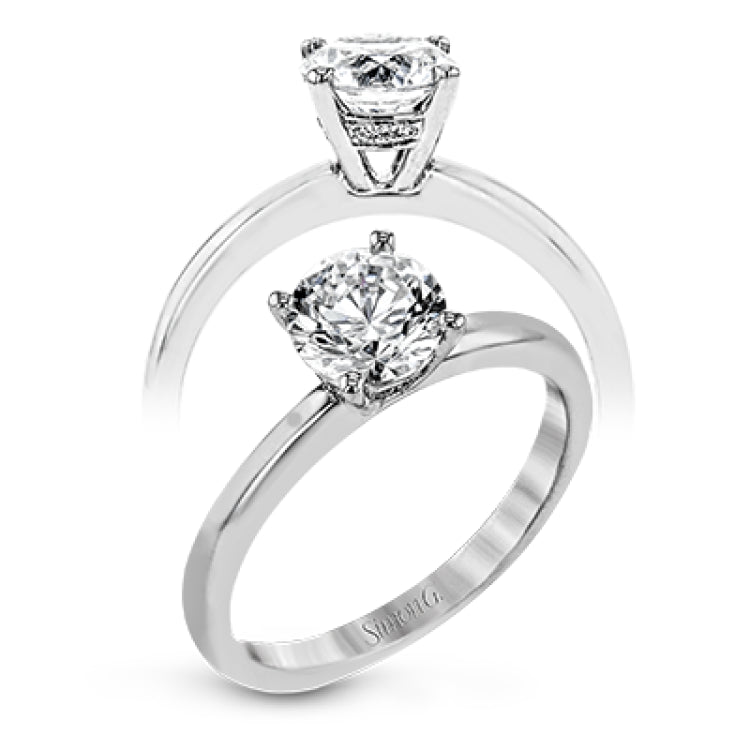 This singular engagement accents the center stone with a touch of .03 ctw of diamonds around the secure basket setting, while the band shines in high polish metal.