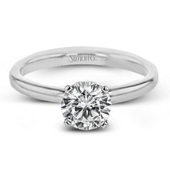 This singular engagement accents the center stone with a touch of .03 ctw of diamonds around the secure basket setting, while the band shines in high polish metal.