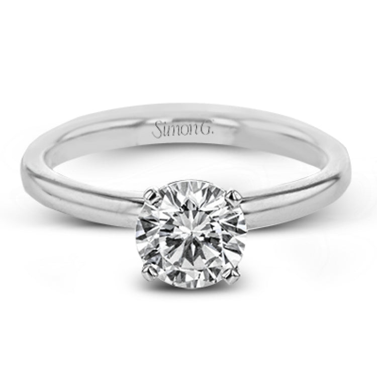 This singular engagement accents the center stone with a touch of .03 ctw of diamonds around the secure basket setting, while the band shines in high polish metal.