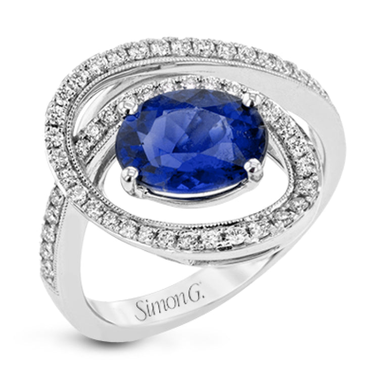 A beautiful 2.04 ct tanzanite center stone anchors this swirling ring, set with .38 ctw of accent diamonds.