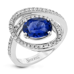 A beautiful 2.04 ct tanzanite center stone anchors this swirling ring, set with .38 ctw of accent diamonds.