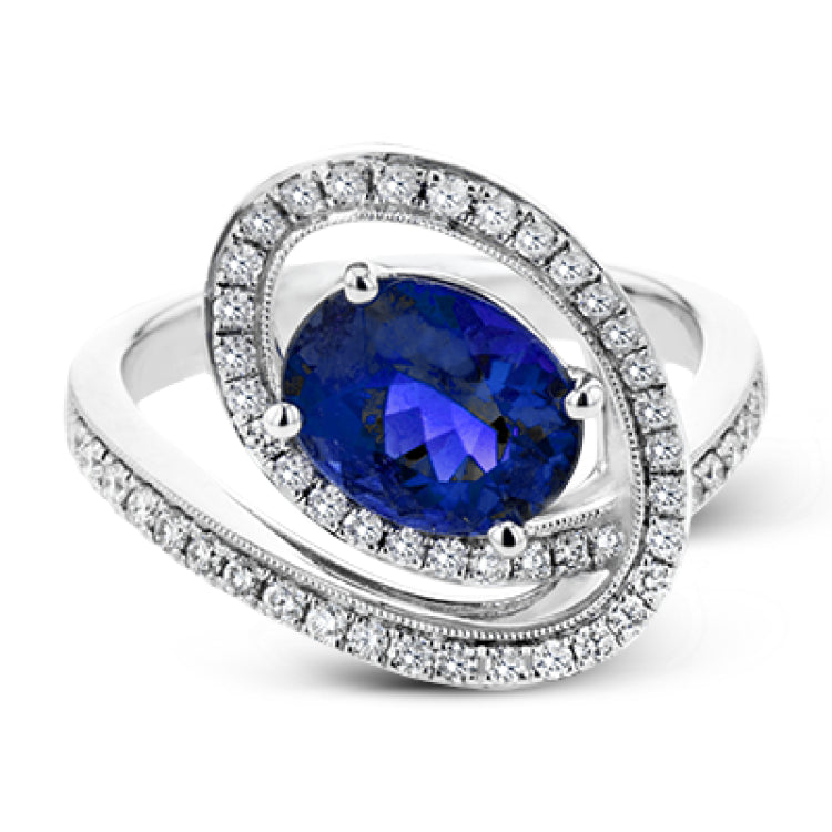A beautiful 2.04 ct tanzanite center stone anchors this swirling ring, set with .38 ctw of accent diamonds.