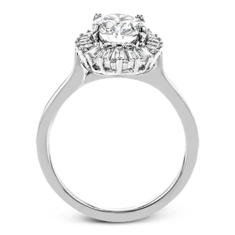 This stunning 18K WG engagement ring is inspired by a ballerinas skirt and features 0.21 ctw RD diam and 0.62 ctw of baguettes, surrounding the center