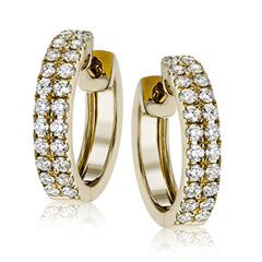 Double the love with these 18k yellow gold hoop earrings that feature a double line of white diamonds that total .53 ctw.
