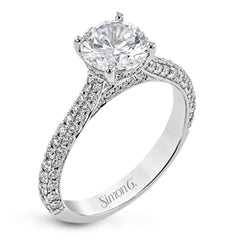 This stunning 18K engagement ring has pave set diamonds of 0.66 ctw., on all 3 sides for a sleek look