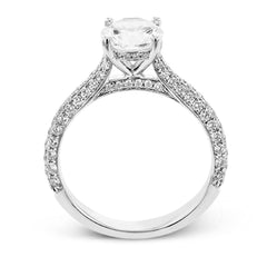 This stunning 18K engagement ring has pave set diamonds of 0.66 ctw., on all 3 sides for a sleek look