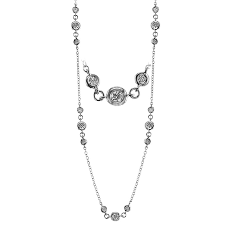 Contemporary and stylish, this necklace design contains .99 ctw of white diamonds in various sizes set with 18k white gold.