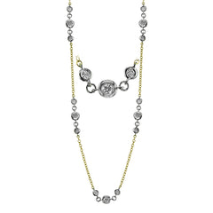 Contemporary and stylish, this necklace design contains 1.00 ctw of white diamonds in various sizes set with 18k white and yellow gold.