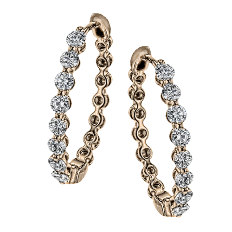 A modern take on a hoop earring, this lovely pair contain .99 ctw of sparkling white diamonds set in rose gold.