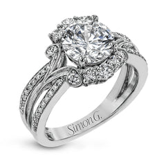 Turn heads with this stunning white gold ring that glitters with an impressive .58 ctw of round white diamond accents.
