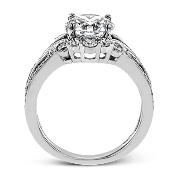 Turn heads with this stunning white gold ring that glitters with an impressive .58 ctw of round white diamond accents.