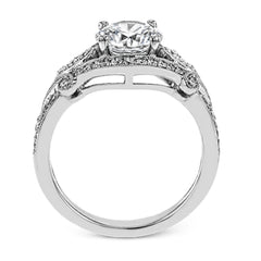 This absolutely exquisite white gold engagement ring dazzles the eye with .38 ctw of round white diamonds in a glamorous, vintage-inspired setting.