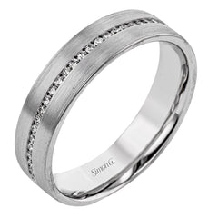 Timless design revealed in this 14k yellow gold band featuring .55cttw diamonds.