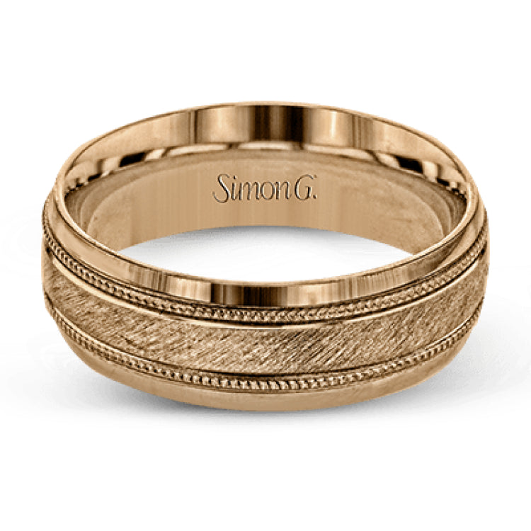 A textured white gold exterior conceals a rose gold interior accent in this elegant, modern wedding band
