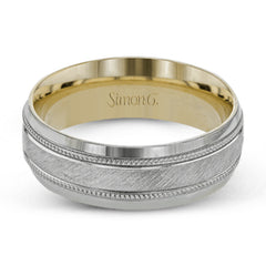 A textured white gold exterior conceals a rose gold interior accent in this elegant, modern wedding band