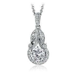 This classic, elegant white gold pendant features .16 ctw of round white diamond accents in a vintage-inspired setting.