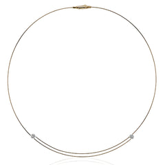 The ends of this elegant, minimalist rose gold necklace sparkle with .08 ctw of white diamonds in white gold for a subtle accent