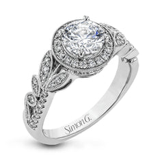 The stunning nature-inspired design of this white gold engagement ring features lovely milgrain edging and a total of .34 ctw of round white diamond accents.