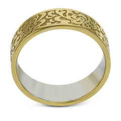 This wedding band's elegant, textured design in yellow gold is accented by a simple white gold interior