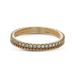 A line of .33 ctw of white diamonds sits alongside a row of granulation in this band that adds the ideal touch of shine. Perfect for stacking with other rings.