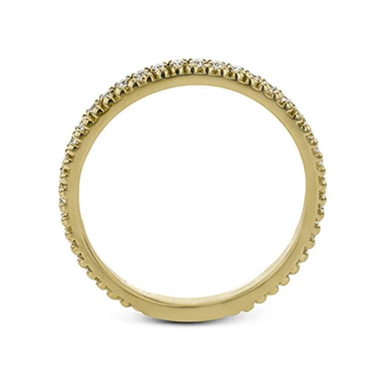 A line of .33 ctw of white diamonds sits alongside a row of granulation in this band that adds the ideal touch of shine. Perfect for stacking with other rings.