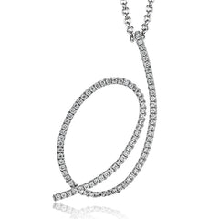 This modern white gold pendant's abstract, swooping shape is set with .29 ctw of glimmering white diamond accents