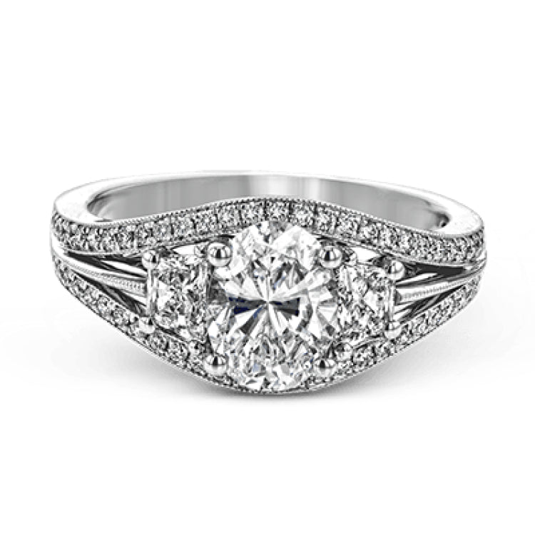 This remarkable white gold ring shows off an oval shaped centerpiece flanked by .47 ctw of trapezoid shaped white diamonds alongside .27 ctw of round white diamonds.