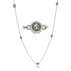 A fun layering piece, this 18K white gold necklace from the diamonds by the yard collection, has stations of rose cut brown dimonds in a bezel setting 1.40 ctw