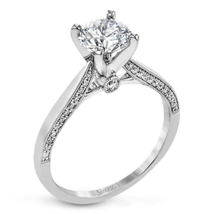 This absolutely stunning white gold engagement ring features a sleek design with .21 ctw of round white diamonds for a touch of glamour.