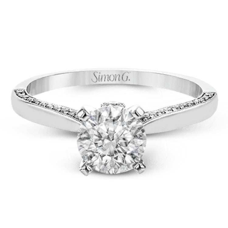 This absolutely stunning white gold engagement ring features a sleek design with .21 ctw of round white diamonds for a touch of glamour.