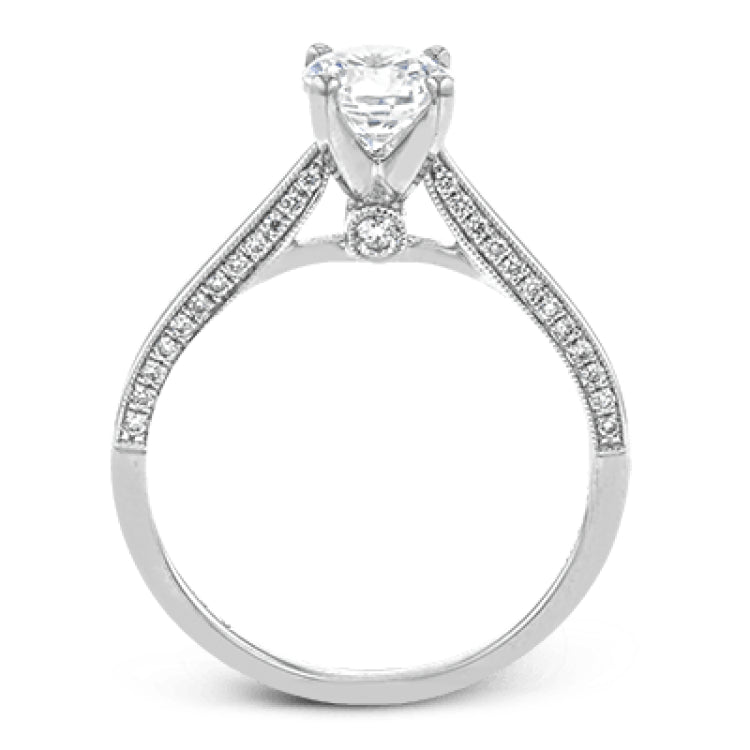 This absolutely stunning white gold engagement ring features a sleek design with .21 ctw of round white diamonds for a touch of glamour.